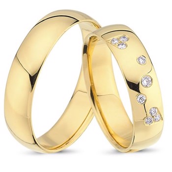 Fra Nuran Love et sæt guld 14 karat Vielsesringe med 0,10 ct diamant Wesselton VS i flot brillant slib